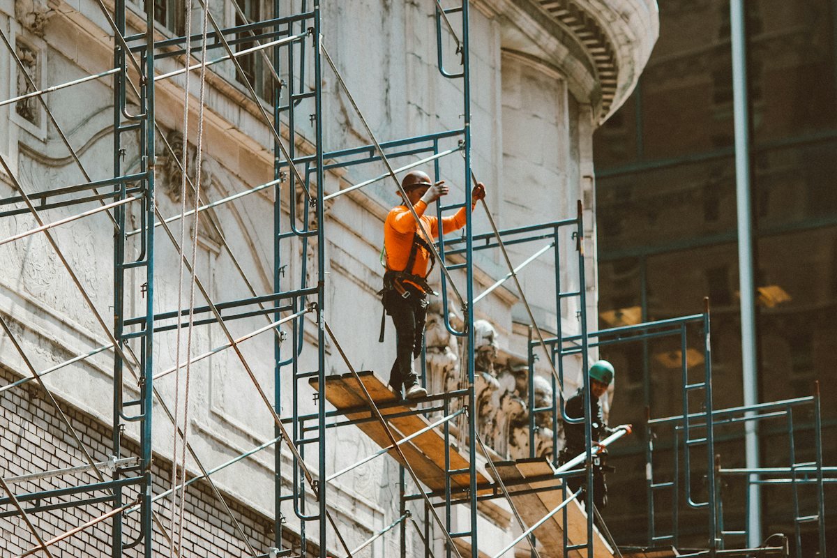 Skilled technician working at height
